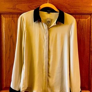 Beautiful cream blouse with black cuffs and goldstone buttons on cuff